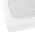 Detailed view of a mattress  featuring the soft and smooth Jenny Mclean La Via Fitted Sheet in white colour.