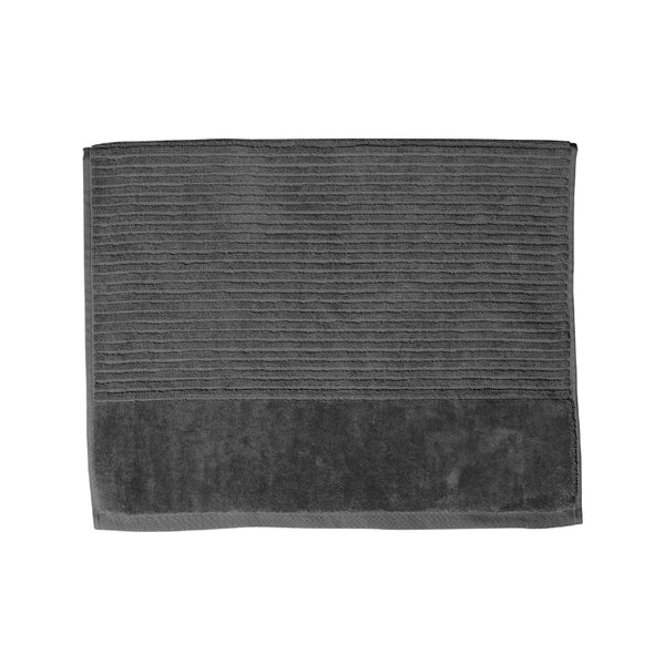 A charcoal bath mat on a white background, highlighting its luxurious feel and vibrant hue, perfect for enhancing bathroom decor.