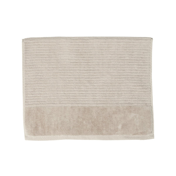 A plaster bath mat on a white background, highlighting its luxurious feel and vibrant hue, perfect for enhancing bathroom decor.