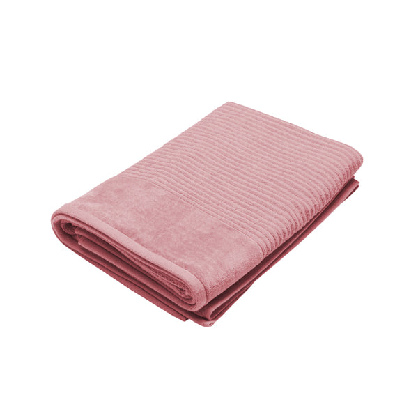 A rosebud bath sheet elegantly displayed on a white background, showcasing its softness and high-quality cotton fabric.