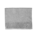 A silver bath mat on a white background, highlighting its luxurious feel and vibrant hue, perfect for enhancing bathroom decor.