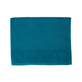A teal bath mat on a white background, highlighting its luxurious feel and vibrant hue, perfect for enhancing bathroom decor.