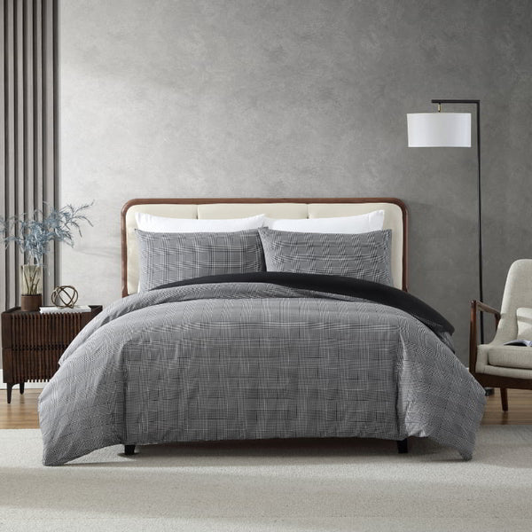 Full view of full Kenneth Cole quilt cover set styled in modern bedroom
