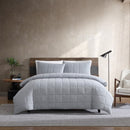 Front view of Kenneth Cole Jersey Marle Blue Grey Quilt Cover Set styled on bed