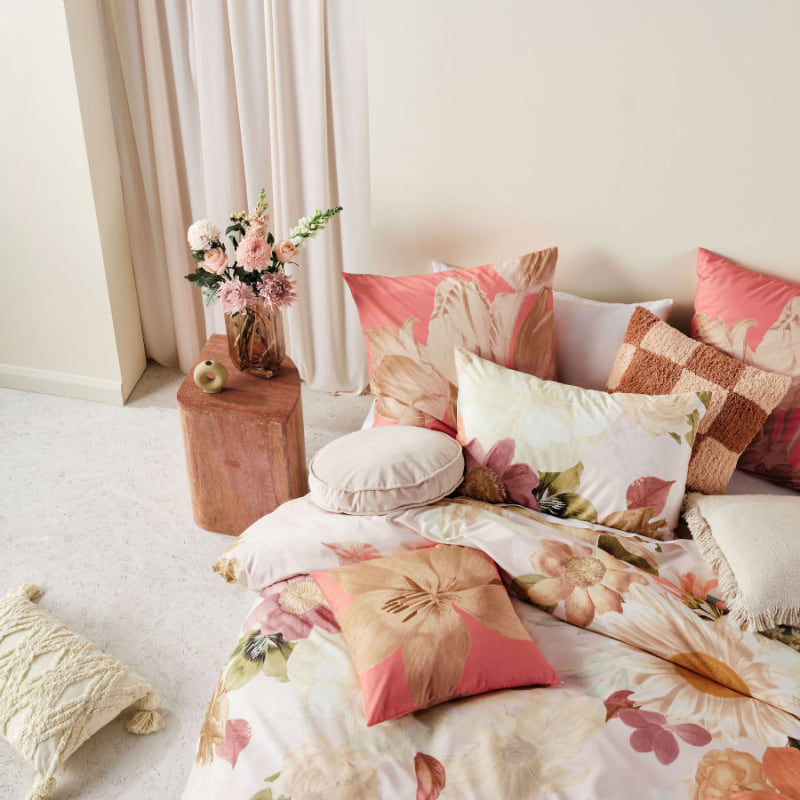 alt="Cotton quilt cover set pairing with aesthetic pillowcases designed with an archival floral in a luxurious bedroom"