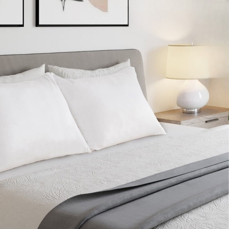 alt="Hypoallergenic white queen pillowcases crafted from premium bamboo fibres, these pillowcases offer unparalleled softness"