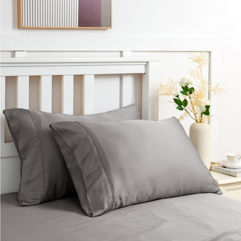 alt="Charcoal sheet set along with the pillows produce a lustrous silky smooth fabric to your bedroom"