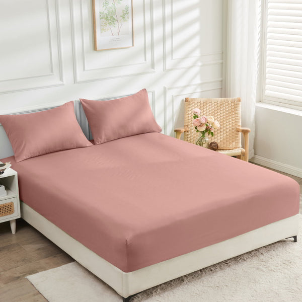 A pink bed fitted sheet offers luxurious comfort with 2000 thread count to your cosy bedroom.