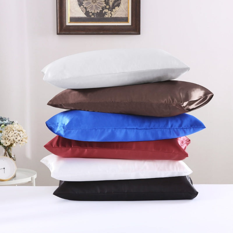 A stack of other set six colourful silky-smooth texture pillowcases that are luxurious, allergy-friendly, and promote healthy hair and skin.