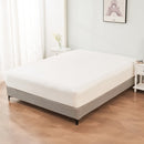 alt="A luxuriously soft 100% cotton white fitted sheet with deep pocket in a cosy bedroom"
