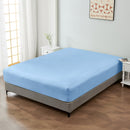 alt="A luxuriously soft 100% cotton light blue fitted sheet with deep pocket in a cosy bedroom"