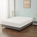 alt="An ultra-soft cotton blend white fitted sheet with deep pocket in a cosy bedroom"