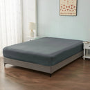 alt="An ultra-soft cotton blend charcoal fitted sheet with deep pocket in a cosy bedroom"