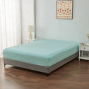 alt="An ultra-soft cotton blend mint fitted sheet with deep pocket in a cosy bedroom"