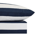 Flatlay of the Odyssey Living Avoca Stripe flannel sheet set in navy with white stripes