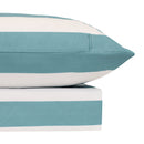 Flatlay of the Odyssey Living Avoca Stripe flannel sheet set in marine with white stripes