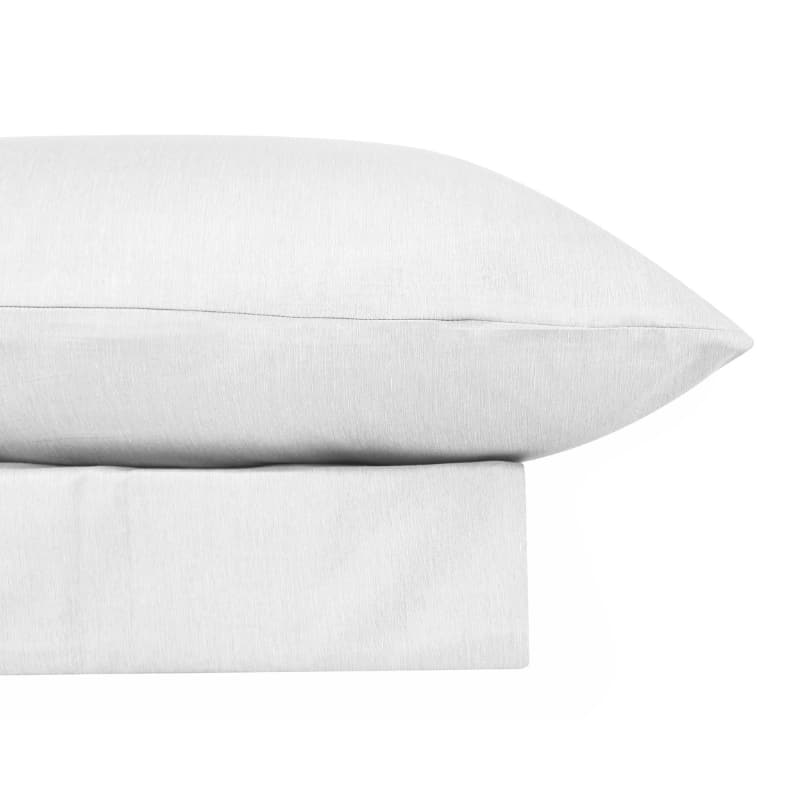 alt="Close-up look of a luxuriously soft to touch bamboo and microfibre blend sheet set in white"