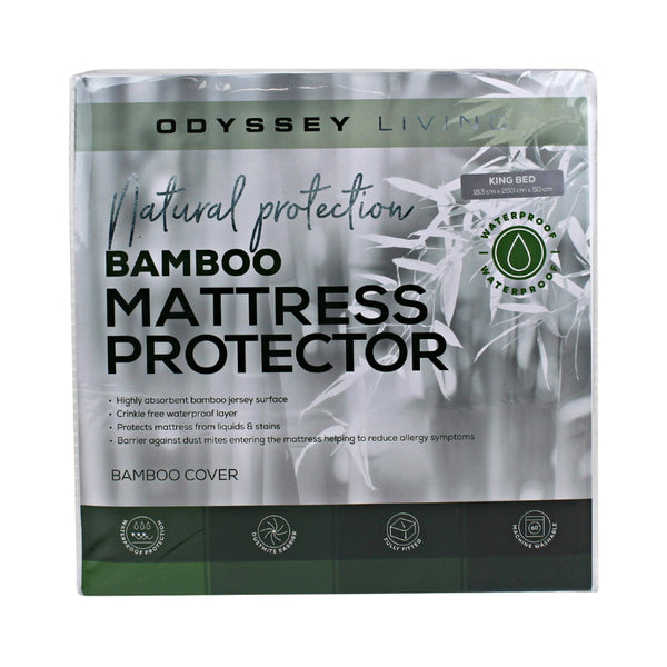 alt="Front details of the packaging of white bamboo mattress protector featuring its greeny and white packaging design"
