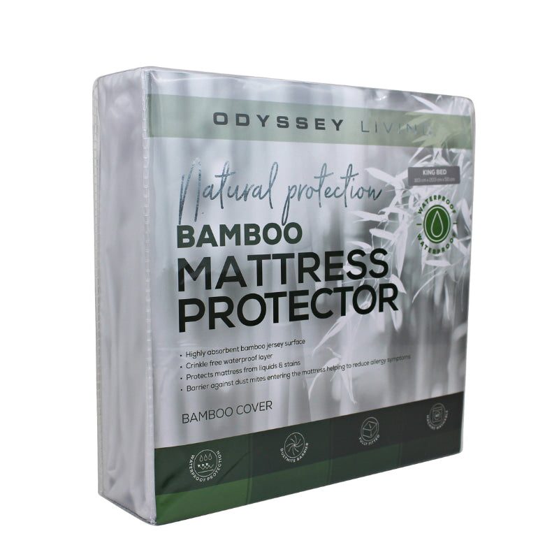 alt="Side details of the packaging of white bamboo mattress protector featuring its greeny and white packaging design" 