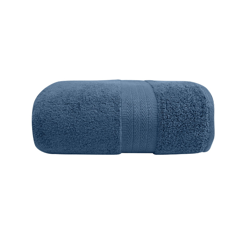alt="Zoom in details of blue haze bath towel featuring its high level of softness and premium luxurious cotton."