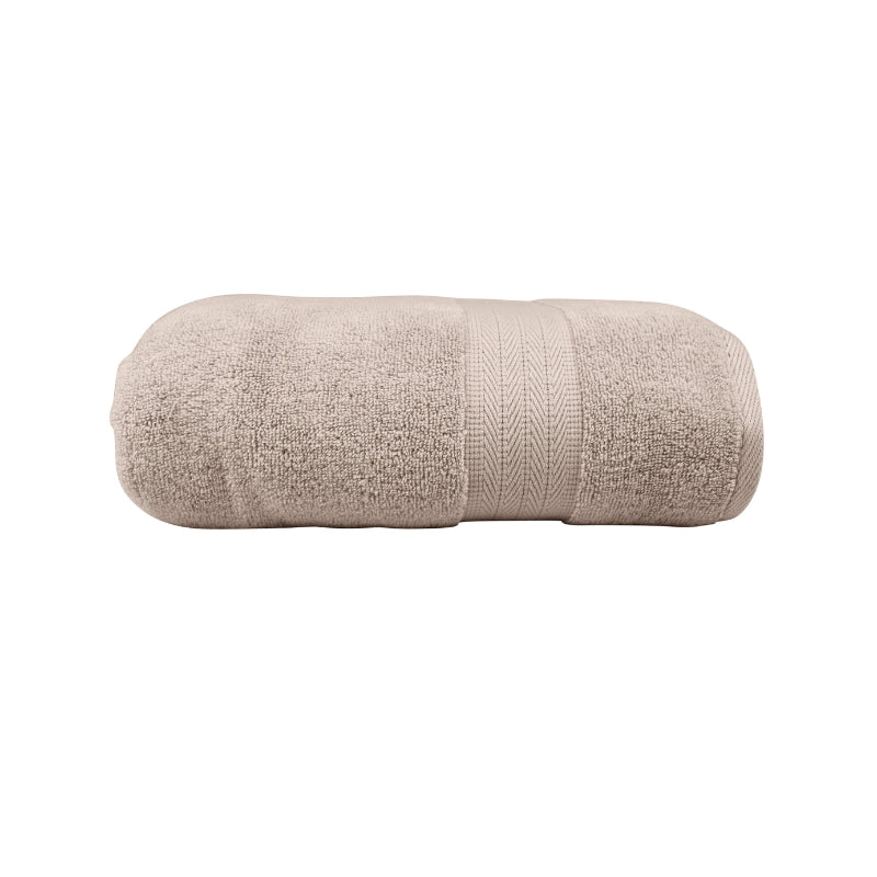alt="Zoom in details of beach bath towel featuring its high level of softness and premium luxurious cotton."
