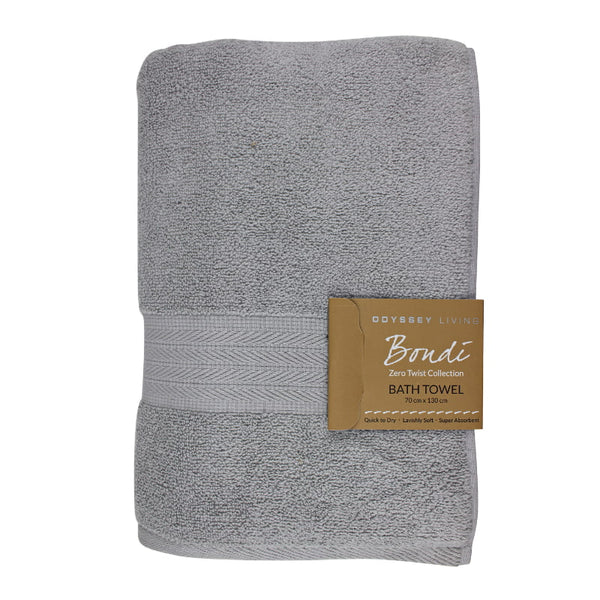 alt="A folded with tag details of silver oasis bath towel featuring its high level of softness and premium luxurious cotton."