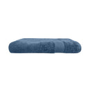 alt="An elegantly folded premium blue haze oasis hand towel, showcasing its minimal and soft details"