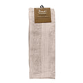 alt="A neatly folded, premium beach hand towel hanging on a hook, showcasing its minimalistic design and inviting softness."
