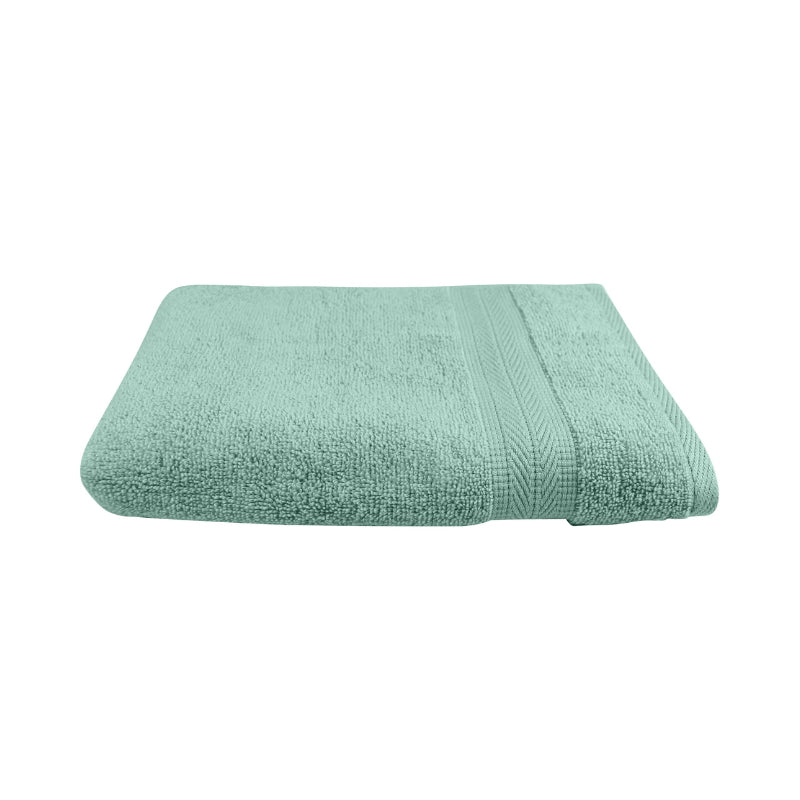 alt="An elegantly folded premium dusty sea colour hand towel, showcasing its minimal and soft details"