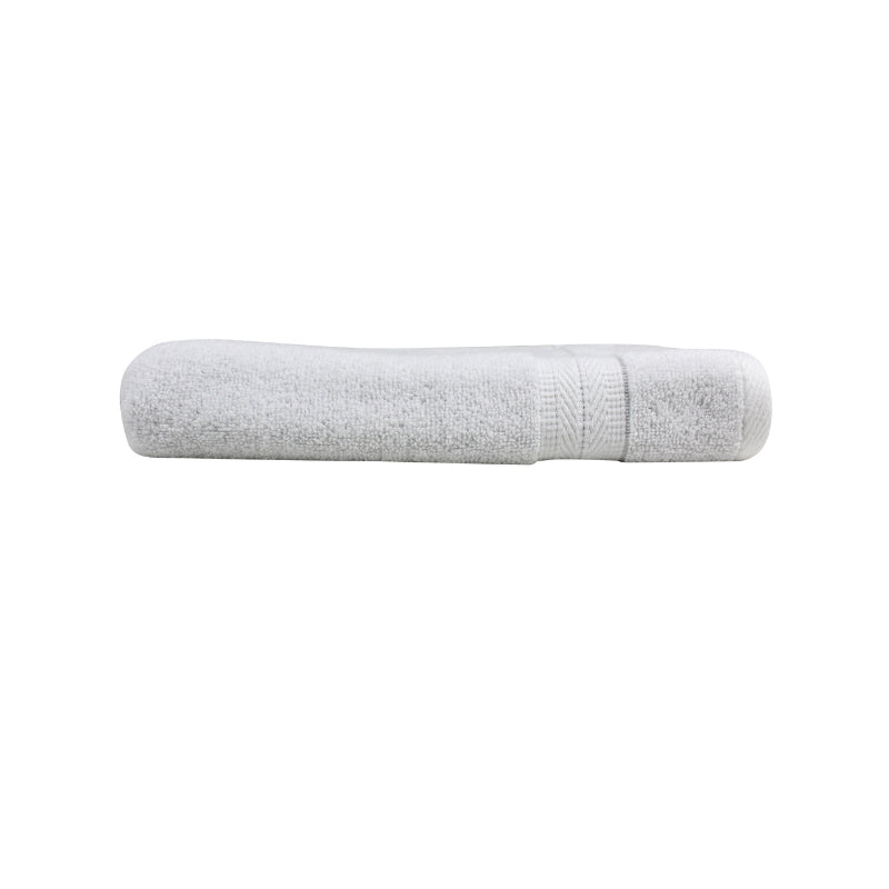 alt="A neatly folded, premium linen hand towel showcasing its minimalistic design and inviting softness."