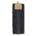 alt="A neatly folded, premium coal colour hand towel hanging on a hook, showcasing its minimalistic design and inviting softness."