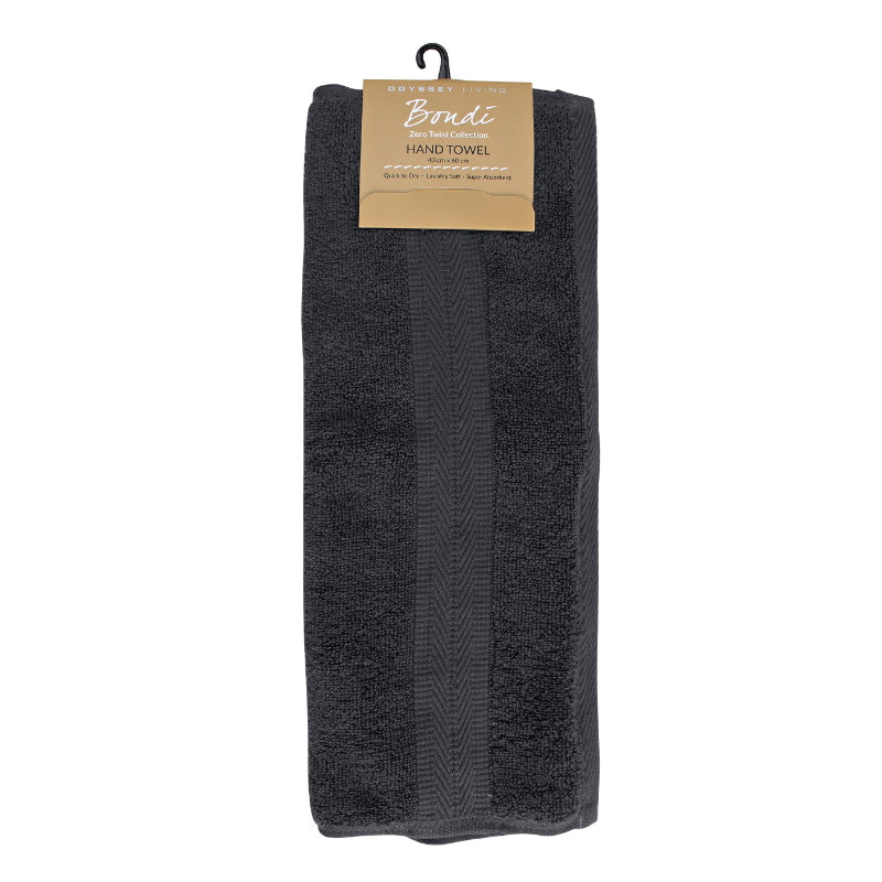 alt="A neatly folded, premium coal colour hand towel hanging on a hook, showcasing its minimalistic design and inviting softness."