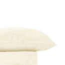 Close up details of a soft and warm marshmallow-coloured comforter set with fleece-like texture, ideal for cooler weather.