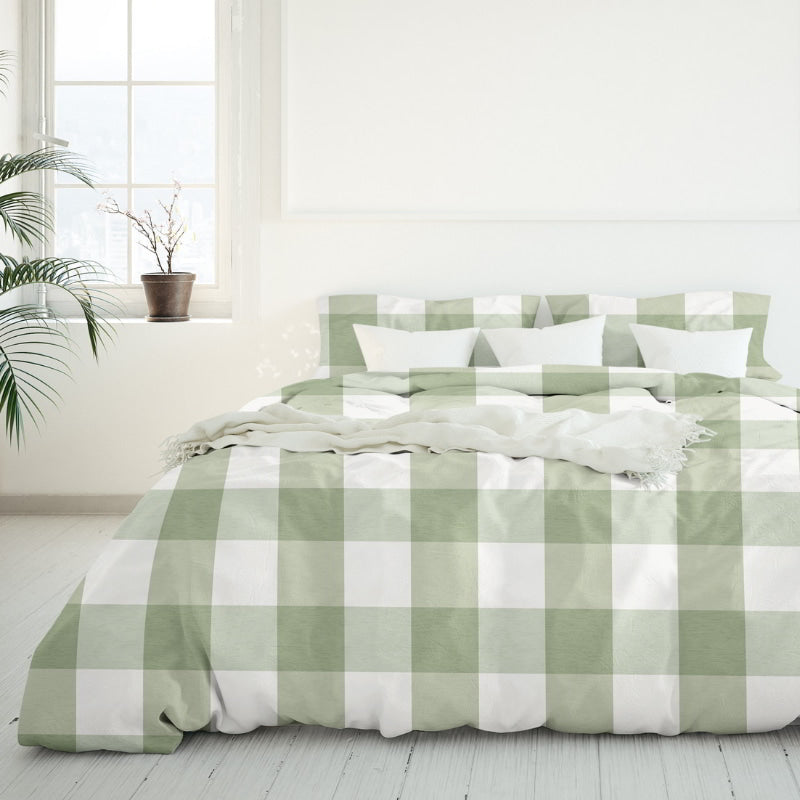 Close up details of the Chelsea Sunwashed Comforter Set that offers a calm, sophisticated touch to your bedroom with its modern design and soft sage and white chequered pattern by Odyssey Living.