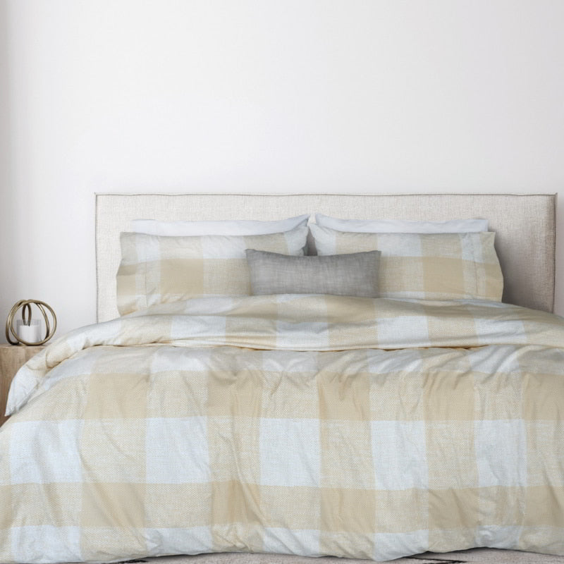 Cornwall Thermal Flannel Sand Quilt Cover Set styled on a bed with matching pillowcases