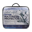 Front details of the packaging of white cotton mattress protector featuring its minimal and elegant packaging design.