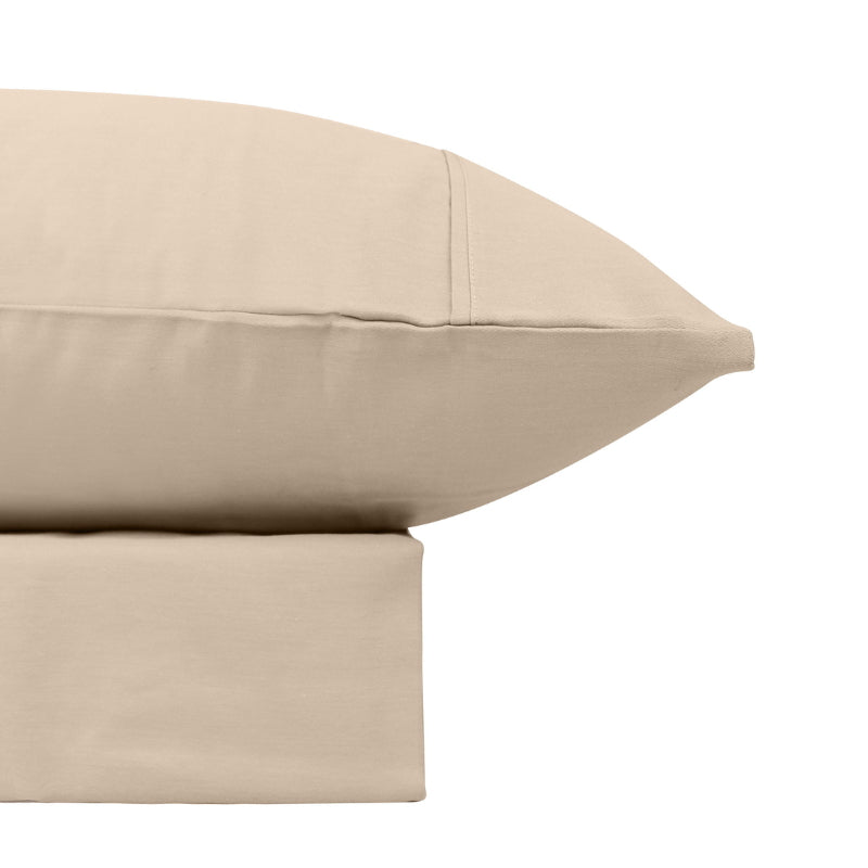 Close-up look of a natural sheet set featuring its softness cotton and durability of polyester comfort for a restful night's sleep.