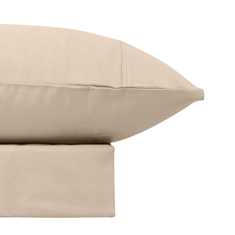 alt="Close-up look of a natural sheet set featuring its softness cotton and durability of polyester comfort for a restful night's sleep"