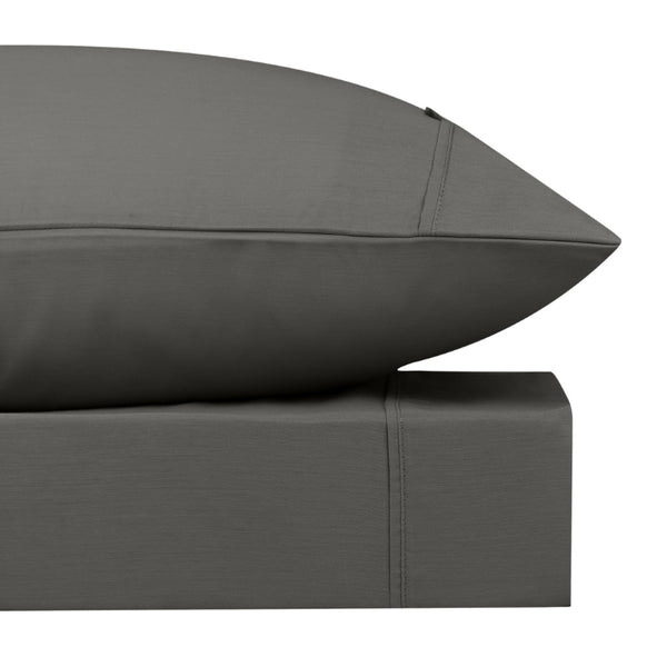 alt="Close-up look of a charcoal sheet set featuring its softness cotton and durability of polyester comfort for a restful night's sleep"