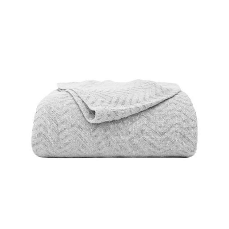 alt="Zoom in details of white Cotton Blanket featuring its unique textured, softness and high quality cotton."