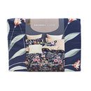 Packaging details of a 100% cotton quilt cover set featuring a bright floral design for comfort and style.