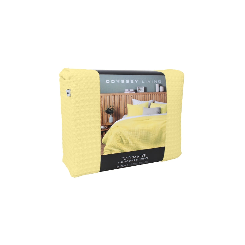 Front side packaging details of a luxurious quilt cover set in a yellow colour scheme featuring a modern texture.