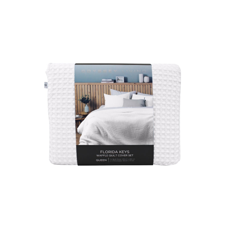 Front packaging details of a luxurious quilt cover set in a white colour scheme featuring a modern texture.