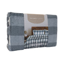 Side packaging view of the storm blue quilt cover on bed showing check pattern