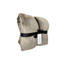 Side packaging details of a luxurious mink touch blanket in a shade of stone featuring minimalist design, soft, velvety texture for cosy warmth. 