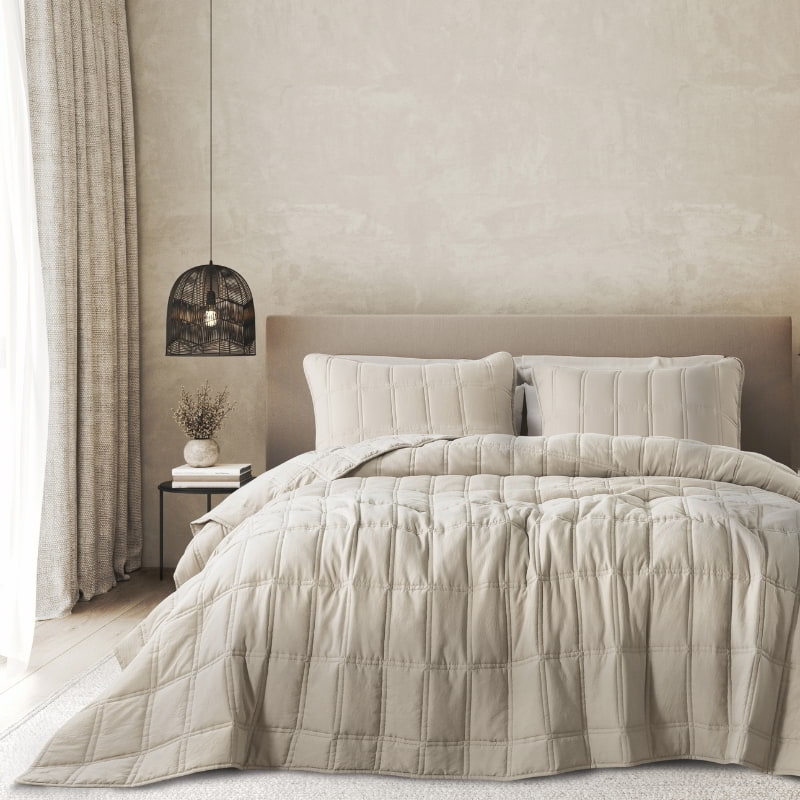 Port Douglas Sunwashed Birch comforter neatly styled on a bed with neutral décor

