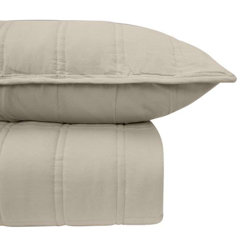 Close-up of the quilted stitching and fabric texture on the birch comforter with pillowcase