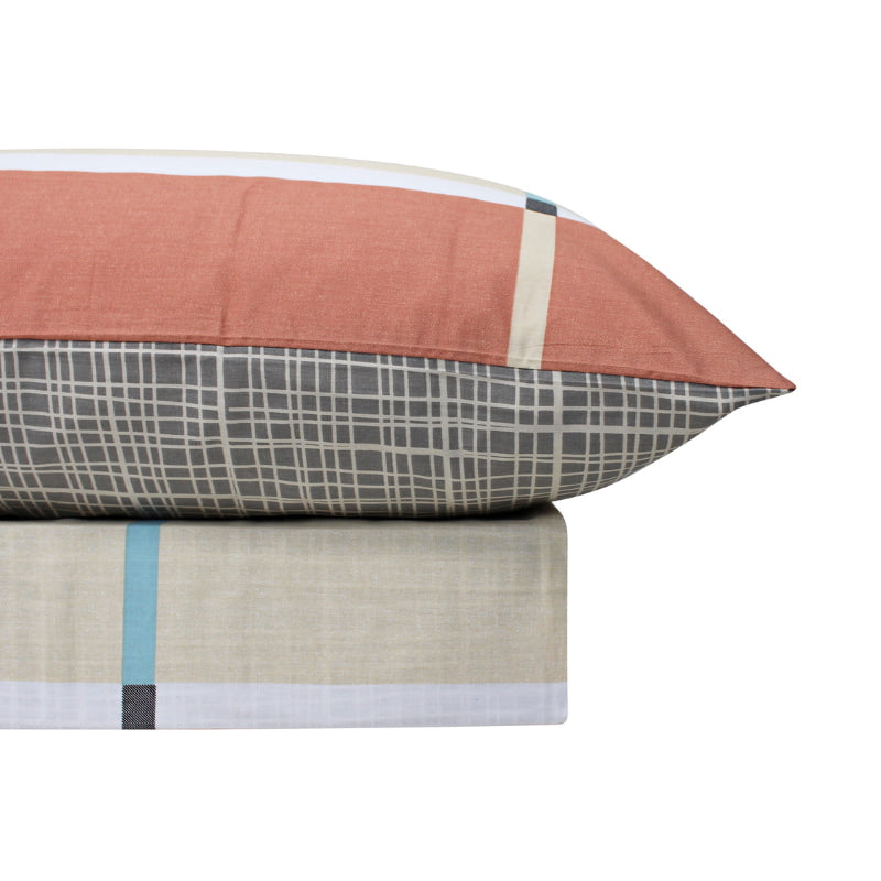 alt="Luxurious quilt cover set features a classic check design reinvented with on-trend hues along with the pillowcases"
