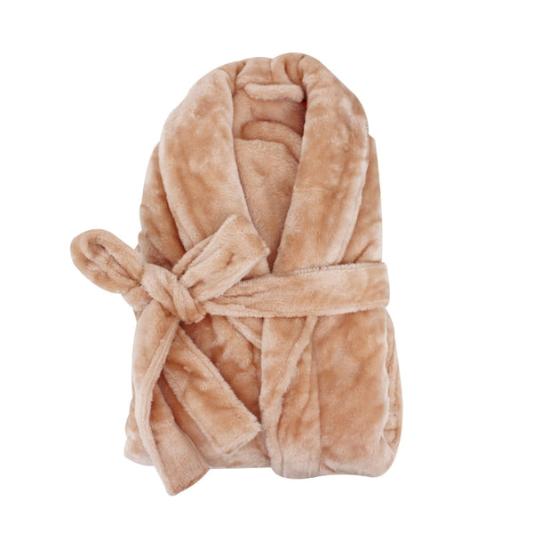 A neatly folded honey beige silk touch bathrobe, exuding luxurious elegance and comfort.