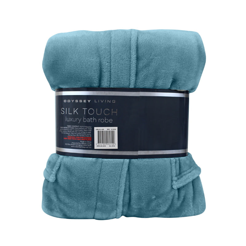  A back details of a neatly folded dusk blue silk touch bathrobe, exuding luxurious elegance and comfort.
